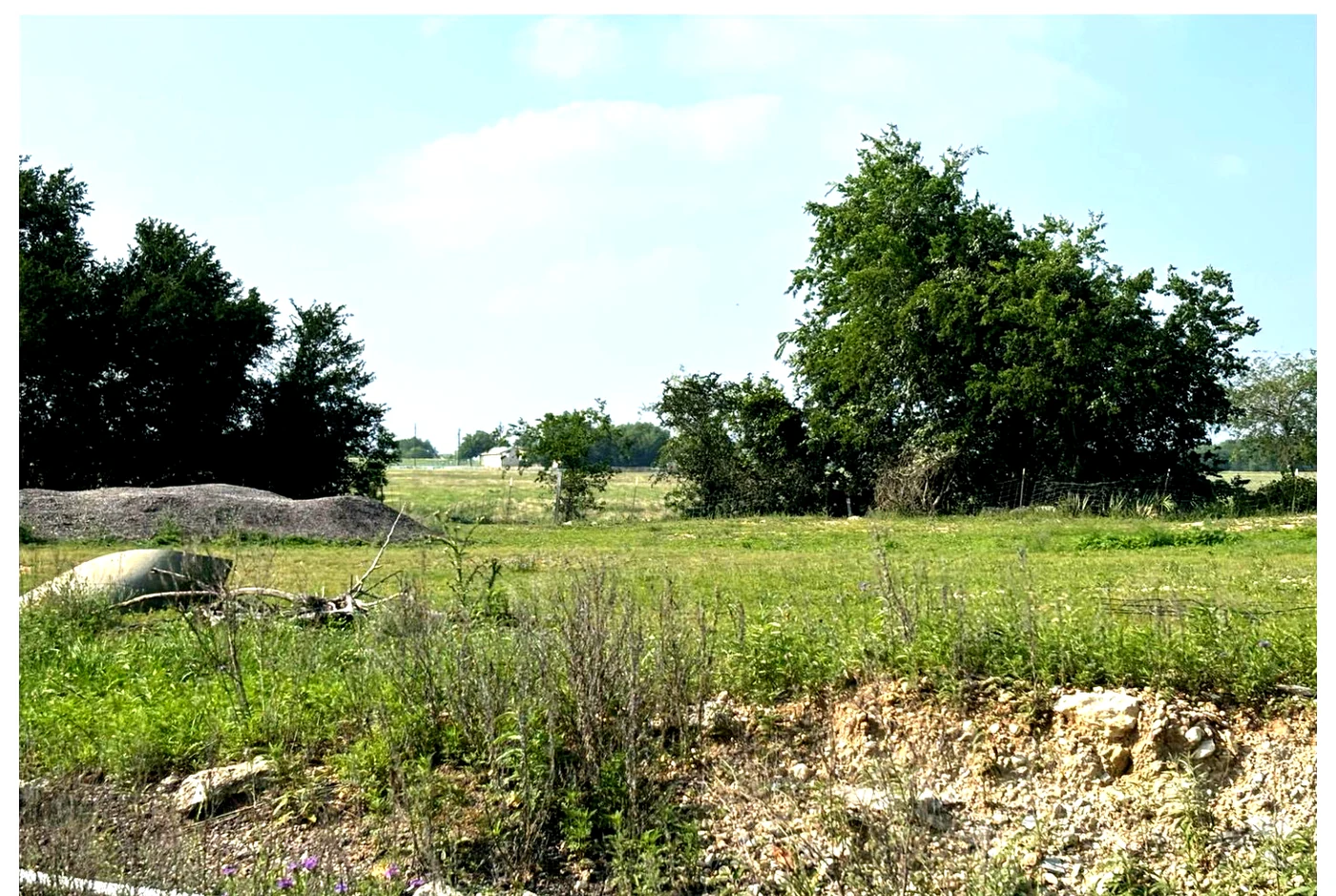 Silo site area showing the open land and active build zone at Still Haven.